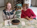 Bonsai_winner_Sharol_T._and_Jillian_K._admire_results..jpg