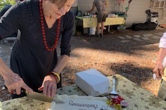 Darlene-Veitch-2023-07-22-Club-picnic-70th-anniversary-Ellen-with-cake