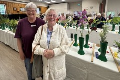 Karen-Wade-2026-06-07-Flower-Show-Karen-with-visitor-jpg-format-crop